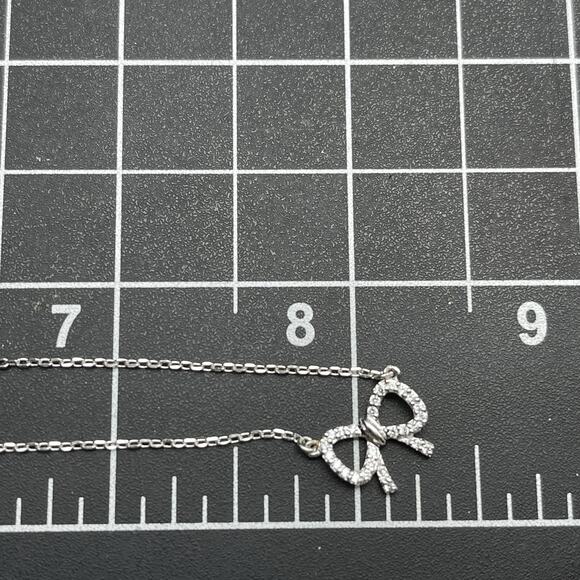Sterling Silver 925 Sparkly CZ Bow Pendant Necklace 16" Dainty Minimalist - Picture 7 of 7